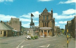 COLOURED POSTCARD HIGH STREET AND THE HORSE MONUMENT - HAWICK - SCOTLAND SHOWING MORRIS MINOR - MINI CAR - SHOPS - Selkirkshire