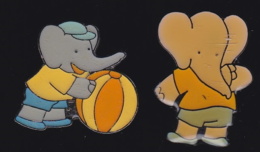 64552- Lot De 2 Pin's-Babar L'élephant.BD.cinéma.signé Ferrier. - BD