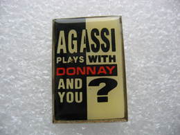 Pin's Pub Pour Raquettes De Tennis De La Marque DONNAY. "Agassi Plays With DONNAY, And You? - Tennis