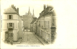 91 DOURDAN PORTE DE CHARTRES LIBRAIRIE BOUTROUE EN 1905 - Dourdan