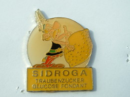 Pin's BD ASTERIX - ASTERIX - SIROP SIDROGA - GLUCOSE FONDANT - SUCRE - BD