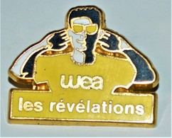 Rare Pin's  Arthus Bertrand WEA Les Révélations - Arthus Bertrand