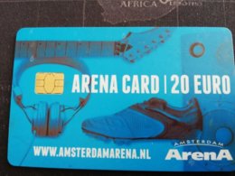 NETHERLANDS CHIPCARD € 20,00-,- ARENA CARD FOOTBAL/SOCCER  GUITAR/SHOE/EARPHONE     USED CARD  ** 1945** - Pubbliche