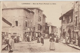 Langeac  43   La Rue Du Pont ( Portail De 1615 ) Tres Tres Animée Et Epicerie - Langeac