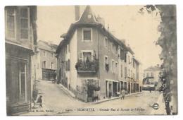 CPA ANIMEE MORESTEL, GRANDE RUE ET MONTEE DE L'EGLISE, ISERE 38 - Morestel