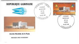 GABON-République Gabonaise-2 Enveloppes 1er Jour-Journée Mondiale Poste(PA 268) Et Inaugur. Transport Owendo Franceville - Gabon