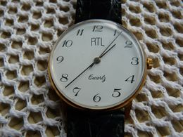 Pub RTL   - Montre Ancienne Quartz  Pour Homme -  Bracelet  D'origine - Année 1975 - Advertisement Watches