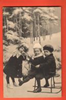 DUA-35 Bonne Année, Enfants Dans La Neige Sur Une Luge  Circculé 1913 - Neujahr