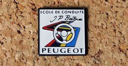 Pin's PEUGEOT Ecole De Conduite Jean Pierre BELTOISE - Peint Cloisonné - Fabricant STARPIN'S - Peugeot