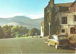 COLOURED POSTCARD - THE ENNISKEEN HOTEL - NEWCASTLE - COUNTY DOWN - SHOWING MINI CAR - Down