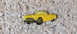 Pin's Ford Thunderbird Cabriolet  Jaune - Verni époxy - Fabricant Inconnu - Ford