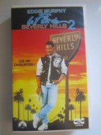 CASSETTE VIDEO VHS Eddie Murphy LE FLIC DE BEVERLY HILLS 2 CA VA CHAUFFER ! (jaquette Abimée) - Action, Adventure