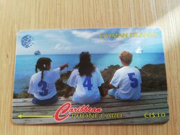 CAYMAN ISLANDS  CI $ 10,-  CAY-131C CONTROL NR 131CCIC   THREE CHILDREN SITTING     Fine Used Card  ** 3109** - Islas Caimán