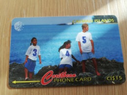 CAYMAN ISLANDS  CI $ 15,-  CAY-131F CONTROL NR 131CCIF   3 CHILDREN ON ROCKS     Fine Used Card  ** 3111** - Kaaimaneilanden