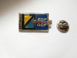 Delcampe - Beau Pin's , EDF GDF , Optimum , Signé BUS IE - EDF GDF
