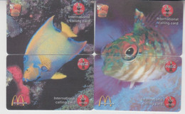 CHINA RED SEA FISH CORAL 2 PUZZLES OF 4 PHONE CARDS - Peces