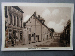 CPA 89 Yonne  CERISIERS  -  La Grande Rue   - Boutique Bonneterie Maison E. Normand - Pays D'Othe   1930 - Cerisiers