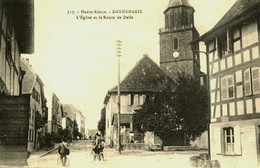 68 / Haut Rhin  / Dannemarie  / L'eglise Et La Route De Delle - Dannemarie