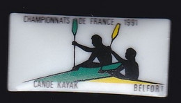 67320- Pin's.Canoé Kayak.1991.Belfort.Porcelaine..signé Thosca Limoges. - Canoë