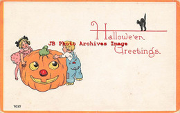 329667-Halloween, Bergman 1913 No 7035-5, Young Boy & Girl Trying To Move Large Jack O Lantern - Halloween