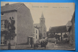 Halanzy, La Rue De L'église Très Animée Aux Environs De Virton. Faute D'orthographe ! - Virton