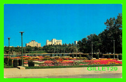 REGINA, SASKATCHEWAN - A VIEW FROM THE LEGISLATIVE GARDENS LOOKING NORTH ACROSS WASCANA LAKE  - TRAVELTIME - Regina