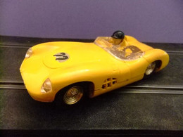 SCALEXTRIC TRI-ANG ASTON MARTIN C57 AMARILLO 22 - Autocircuits