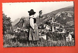 SIO-23 Valère Et Tourbillon, Sion Avec Valaisanne En Costume Et Channe à Vin. Non Circulé, Schmid 222 - Sion