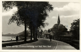 Nederland, ALPHEN A/d RIJN, Oudshoornscheweg Met N.H. Kerk (1950s) Ansichtkaart - Alphen A/d Rijn