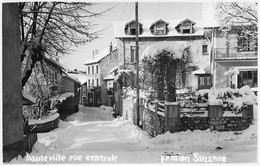 Carte Postale Photo HAUTEVILLE-LOMPNES-01-Ain-Belley-Rue Centrale Pension Suzanne Sous La Neige-Hiver - Hauteville-Lompnes