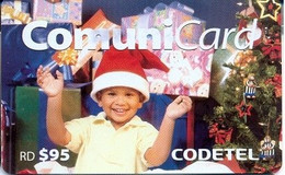 CODETEL : DMC084 RD$95 Christmas 1 Young Boy With Gifts USED - Dominicana