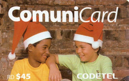 CODETEL : DMC083 RD$45 2 Young Boys X)mas-cap USED - Dominicaine