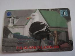 FALKLAND ISLANDS  20 POUNDS  BIRD/SEAGULL  WITH  LOGO C&W   PREPAID   **4419** - Islas Malvinas