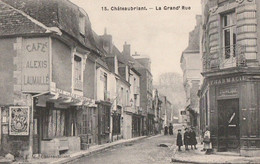 CHATEAUBRIANT. - La Grand'Rue. PUBLICITE SINGER. Carte RARE - Châteaubriant