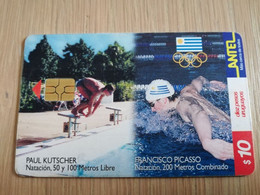 URUGUAY CHIPCARD  SPORTS    $10      PAUL KUTCHER SWIMMING           Nice Used Card    **4540** - Uruguay