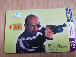 URUGUAY CHIPCARD  SPORTS    $25  LUIS MENDEZ  PISTOLA 10 METROS             Nice Used Card    **4544** - Uruguay