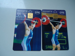 GREECE  2 USED  CARDS  OLYMPIC GAMES LIFTING WEIGHTS - Juegos Olímpicos