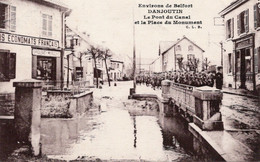 Danjoutin Le Pont Du Canal Et La Place Du Monument  Défilé Militaire   économats Français - Danjoutin