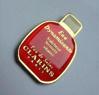 GP183 Pin's PARFUM PERFUME COSMETIQUE CLARINS Achat Immédiat - Parfums
