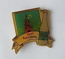 Pin's  Parc  EURODISNEY  Avec  Marque  Boisson  VITTEL - Disney