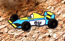 Pin's AUTOMOBILE SPORT F1 - Essence ELF F1 Capot Jaune - Peint Cloisonné  - Fabricant BOOMERANG - F1