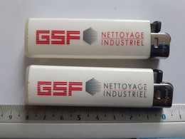 2 Briquets Publicitaires Usagés - GSF Nettoyage Industriel (Feudor) - Autres & Non Classés