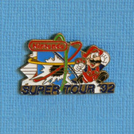 1 PIN'S //  ** NINTENDO SUPER TOUR '92 ** . (Nintendo) - Jeux