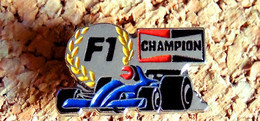 Pin's AUTOMOBILE SPORT F1 - Bougies CHAMPION Bleu - Peint Cloisonné  - Fabricant Inconnu - F1