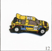 Pin's Sport Auto / Rallye Paris-Dakar 1990 Peugeot Racing Service 205 - Sponsors Michelin & Esso. Est. D&M. EGF. T791-12 - Peugeot