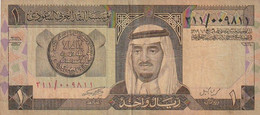 Billet De Banque Usagé. Arabie Saoudite.  1 Rial. Personnage. Paysage. Etat Moyen. Taches. - Saoedi-Arabië