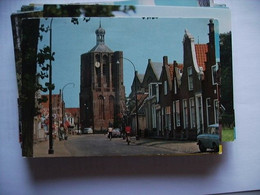 Nederland Holland Pays Bas Workum Met Toren ,Oude Auto's En Fietsers - Workum