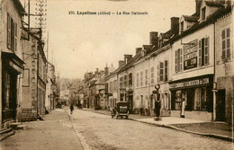 Lapalisse * La Rue Nationale * Société économique D'alimentation De Lyon * Automobile Voiture Ancienne * Pompe à Essence - Lapalisse