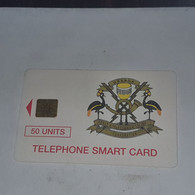 Uganda-(UG-12B)-telecom Logo-(8)-(50units)-(?)-(look Out Side And Chip)+1card Prepiad/gift Free - Ouganda