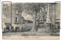 CPA 13 EYGUIERES FONTAINE COCOTTE JG ARTICLES DE CHASSE BOULANGERIE ABIMEE - Eyguieres